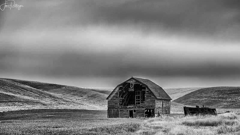 Holey_Barn_with_Storm_Brewing