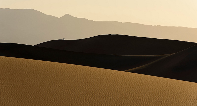 Photographer Enjoying Dawn On the Dunes