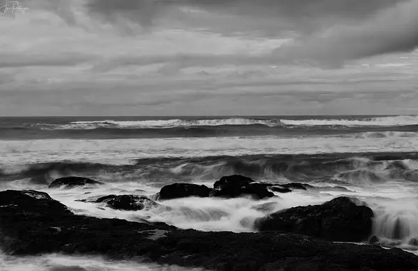 Stormy Day on Oregon Coast b and w by jgpittenger