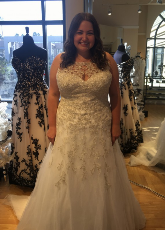Sleeveless beaded plus size wedding gown from Darius Cordell