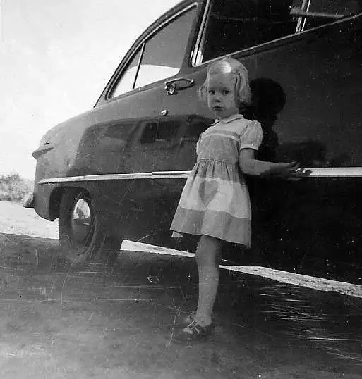 Fran Abrahamson standing next our car a 1950 by...