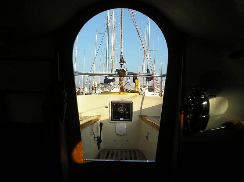 Rosina looking aft through companionway with engine control panel