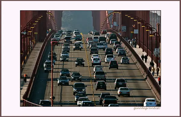 Traffic on the bridge by Gino De  Grandis