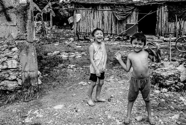 Kids in a small mexican village by Gino De  Grandis
