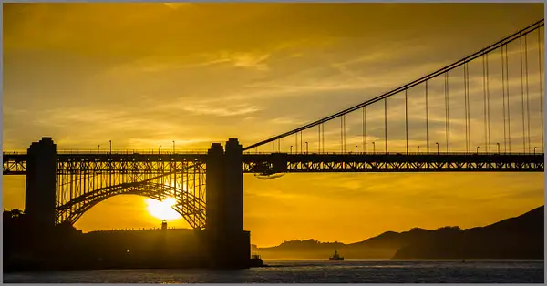 Sunset by Golden Gate Bridge in SF,CA by Gino De  Grandis