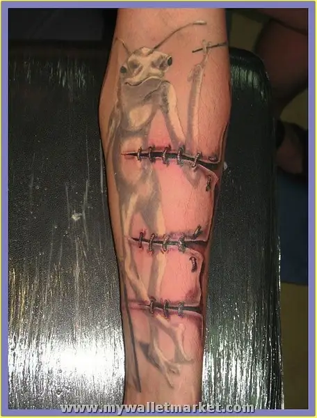 ripped-skin-stitched-cut-3d-arm-tattoo by...