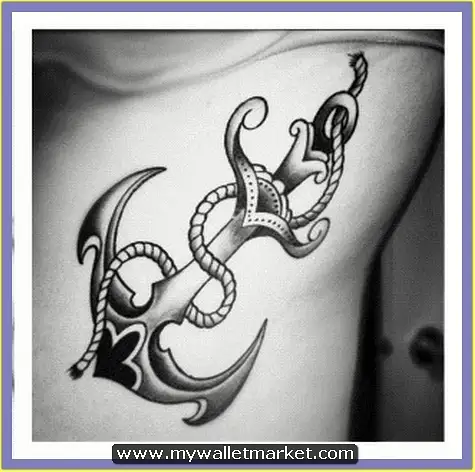 grey-ink-anchor-tattoo-on-rib-side by catherinebrightman