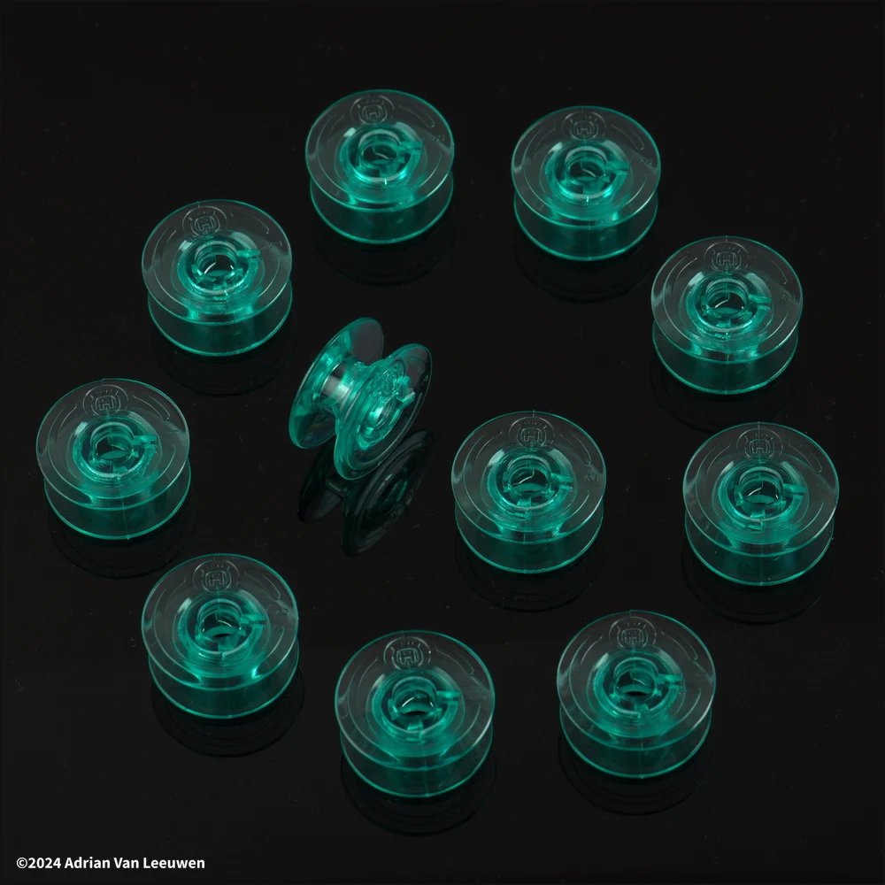 sewing-bobbins-green