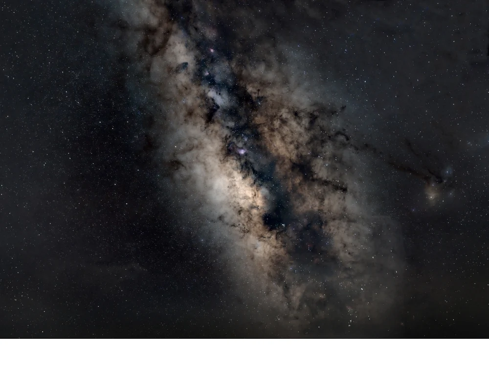 'Detail of the Milky Way galactic core. The light is from millions of stars near the center, at which there is a super massive b
